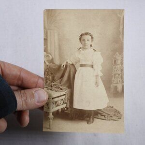 Antique albumen salt print photograph of a little girl, Victorian studio